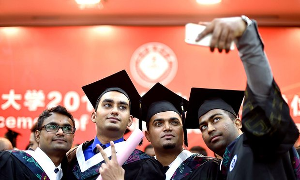 International students celebrating their graduation